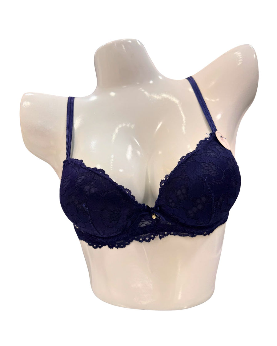 Navy blue bra on a mannequin bust against a white background